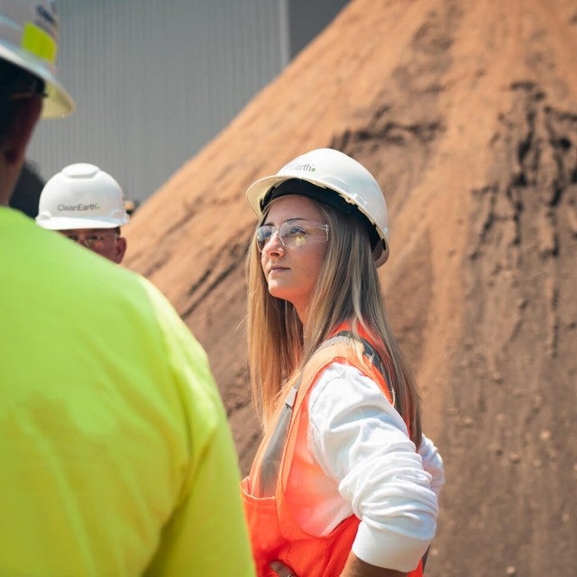 Woman outside at facility tour 