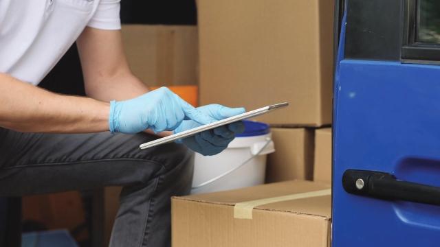 person on tablet doing inventory