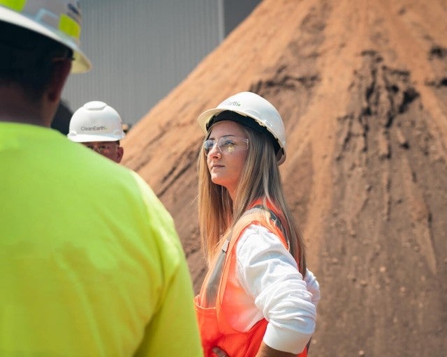 Woman outside at facility tour 