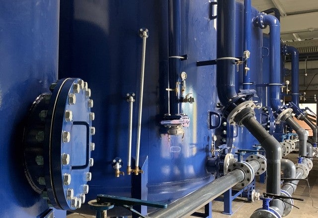 PFAS blue storage tanks in storage facility